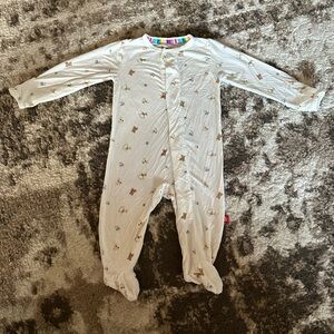 Magnetic Me Cream Footed One-Piece with baby toys